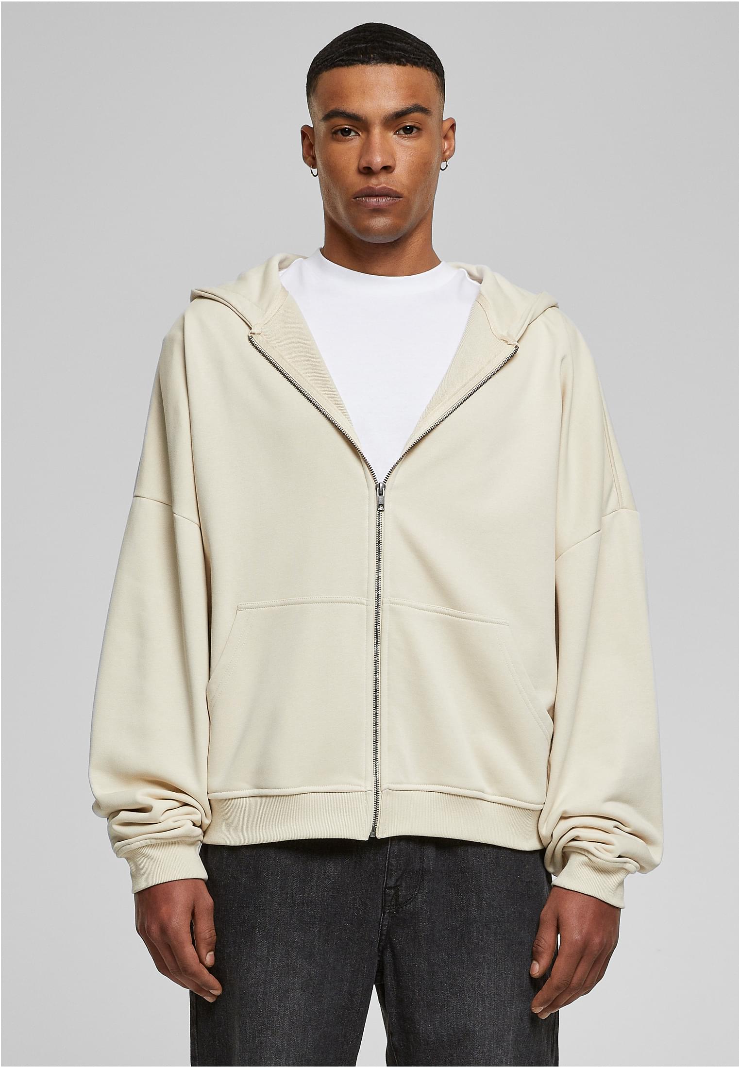 Men's 90s Zip Hoodie in soft terry fabric, featuring a large hood, split kangaroo pocket, and metal zipper for a stylish urban look.