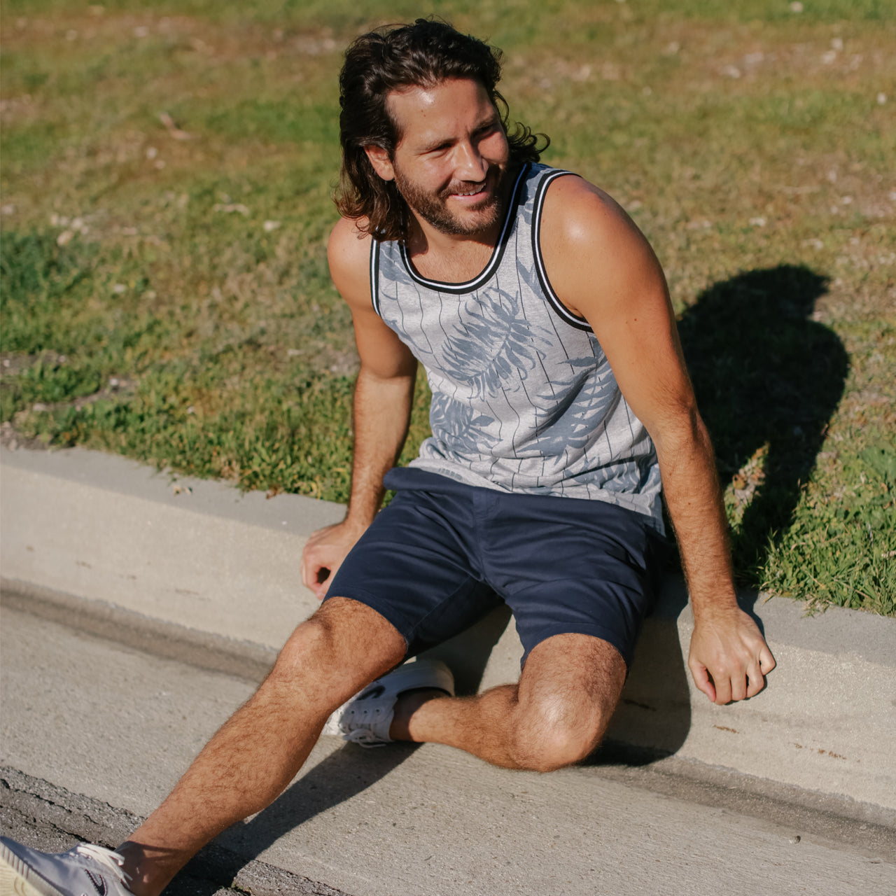 Adan Twill Shorts in navy color, featuring four pockets and a 9-inch inseam, made from a cotton-spandex blend.