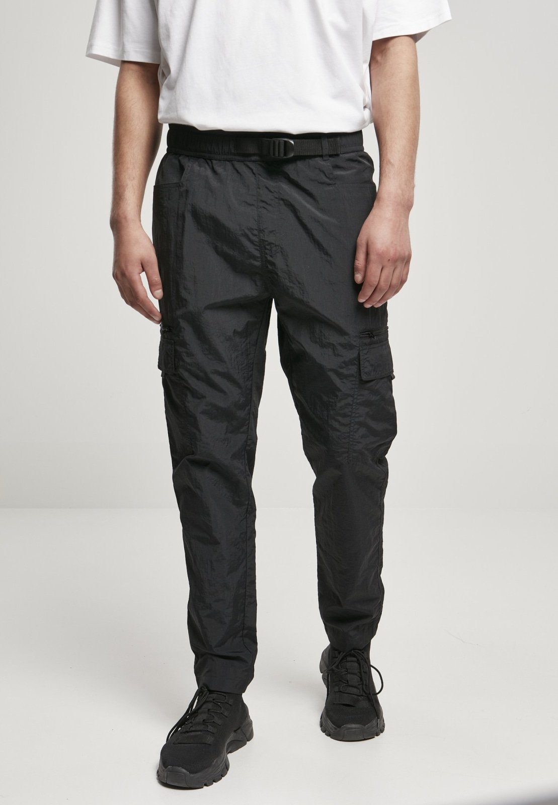 Men's adjustable nylon cargo pants featuring multiple pockets and a matching belt, perfect for summer wear.