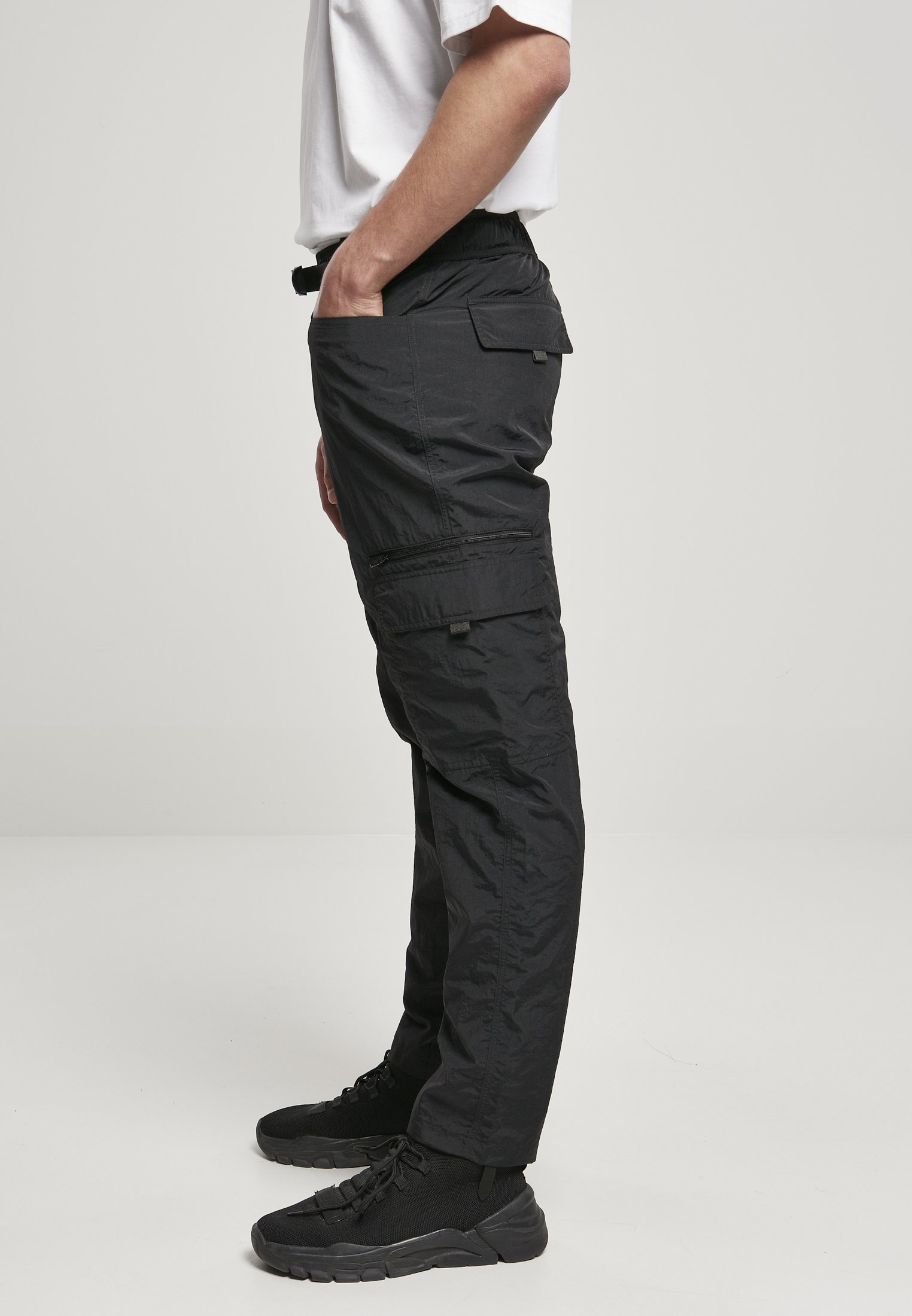 Men's adjustable nylon cargo pants featuring multiple pockets and a matching belt, perfect for summer wear.