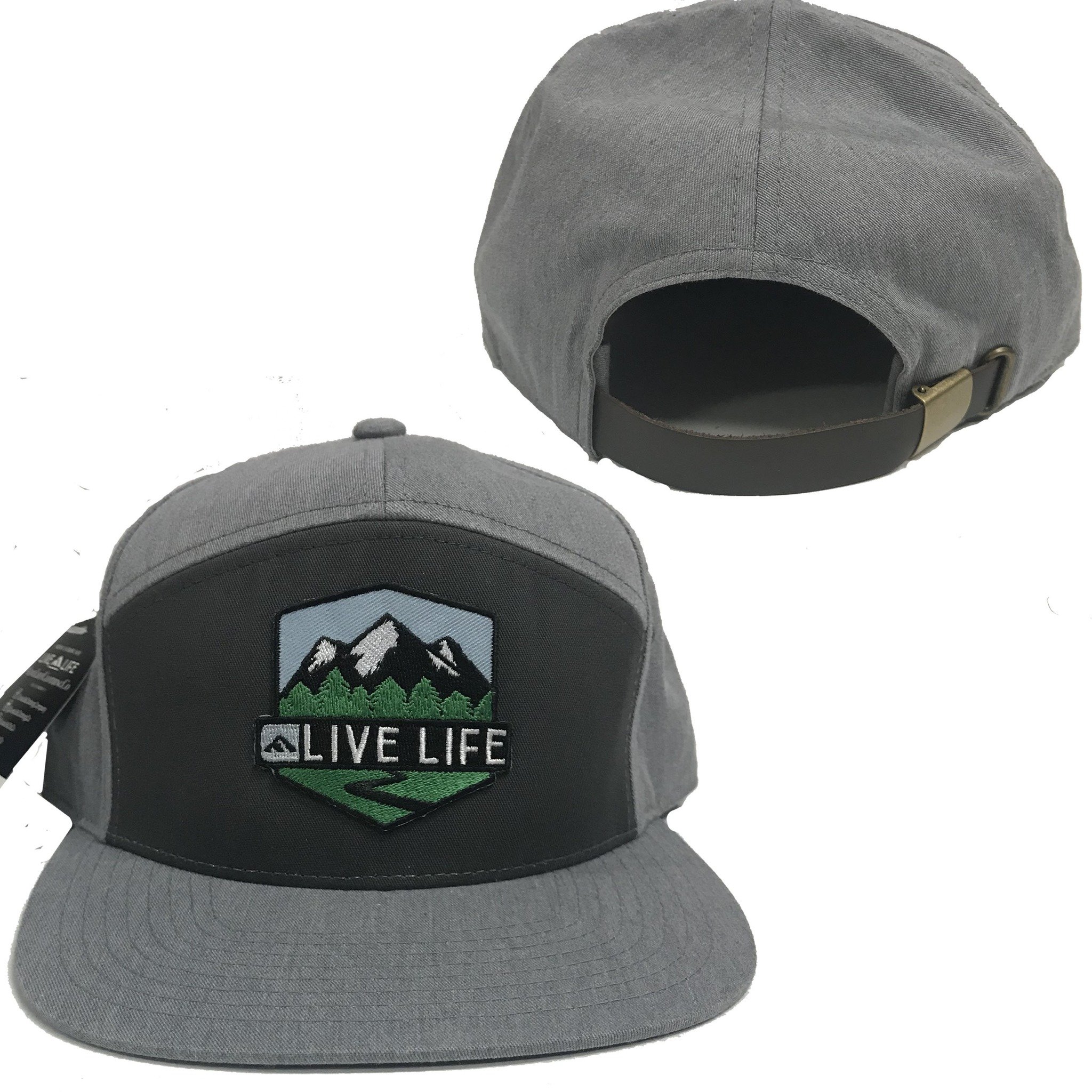 Grey two-tone Badge Life 7 Panel hat with a soft leather strap, showcasing its stylish design and comfortable fit.