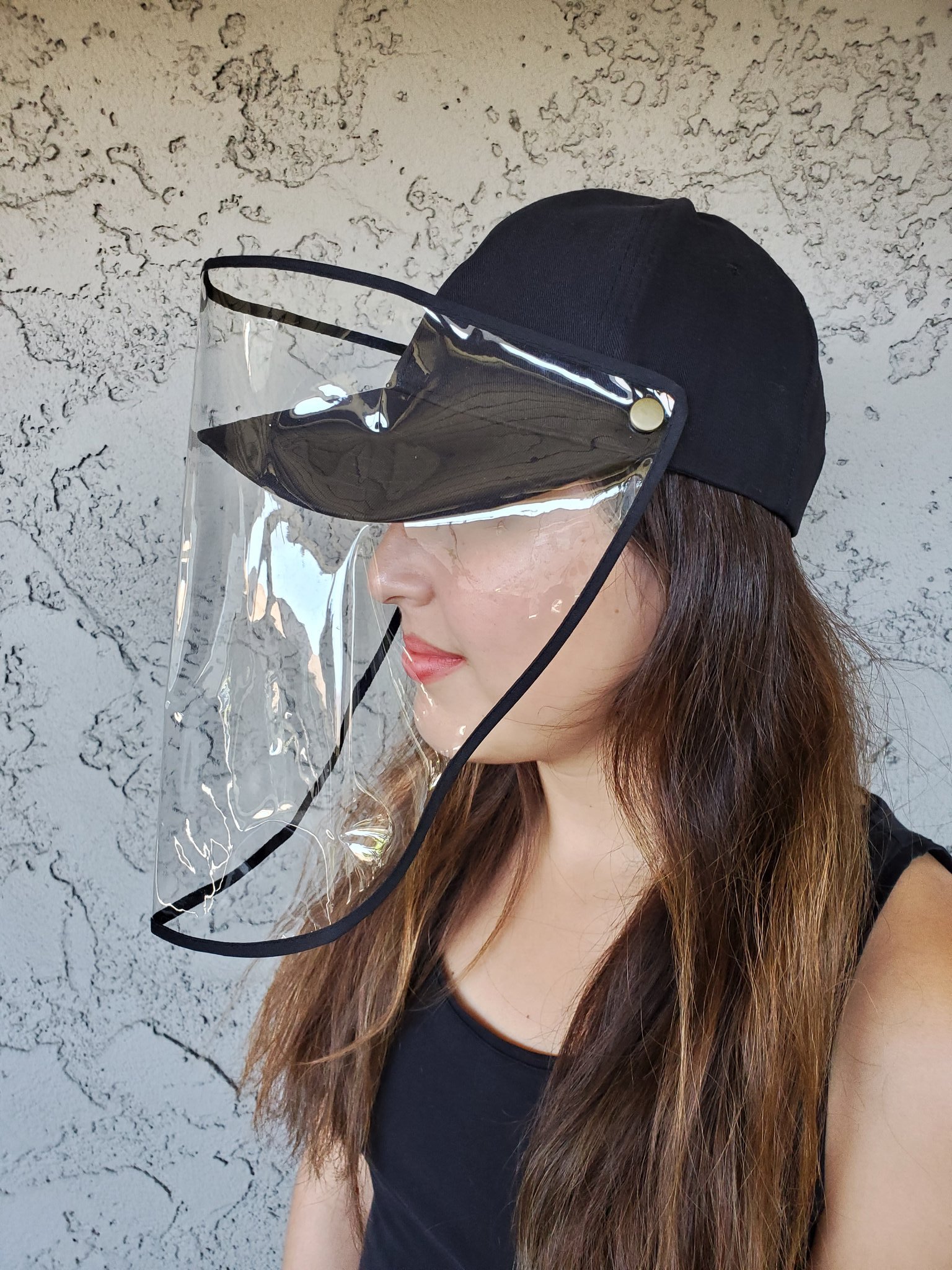 Baseball cap with detachable front panel, showcasing its unique design and protective features for outdoor activities.