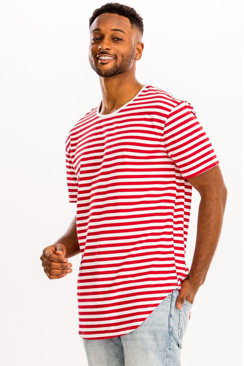 A model wearing a BASIC STRIPED TEE in an oversized fit, showcasing its stylish stripes and comfortable fabric.