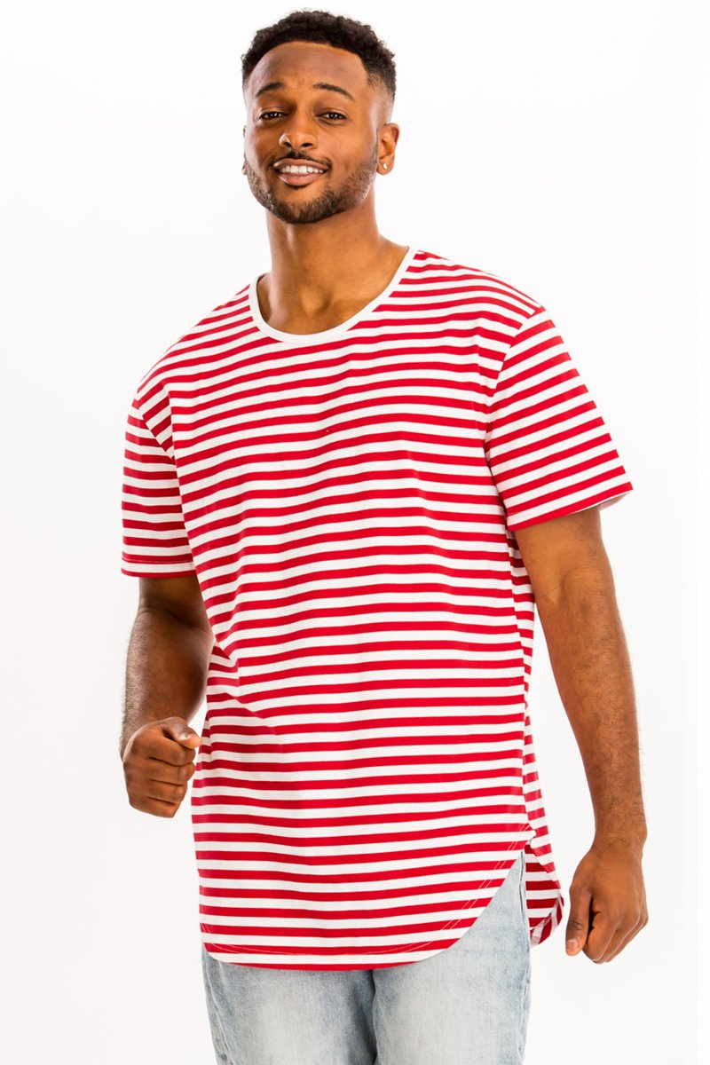 A model wearing a BASIC STRIPED TEE in an oversized fit, showcasing its stylish stripes and comfortable fabric.