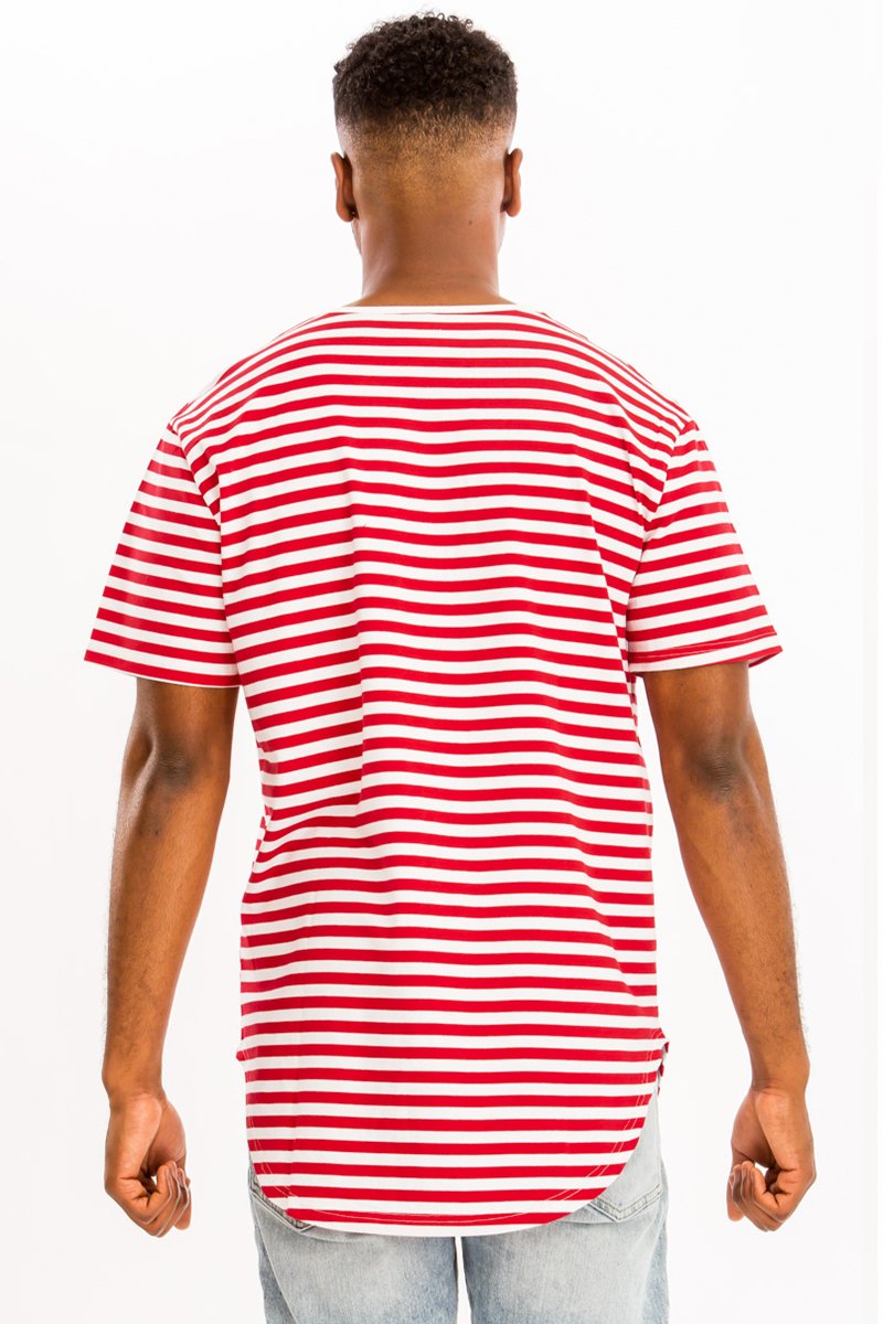 A model wearing a BASIC STRIPED TEE in an oversized fit, showcasing its stylish stripes and comfortable fabric.