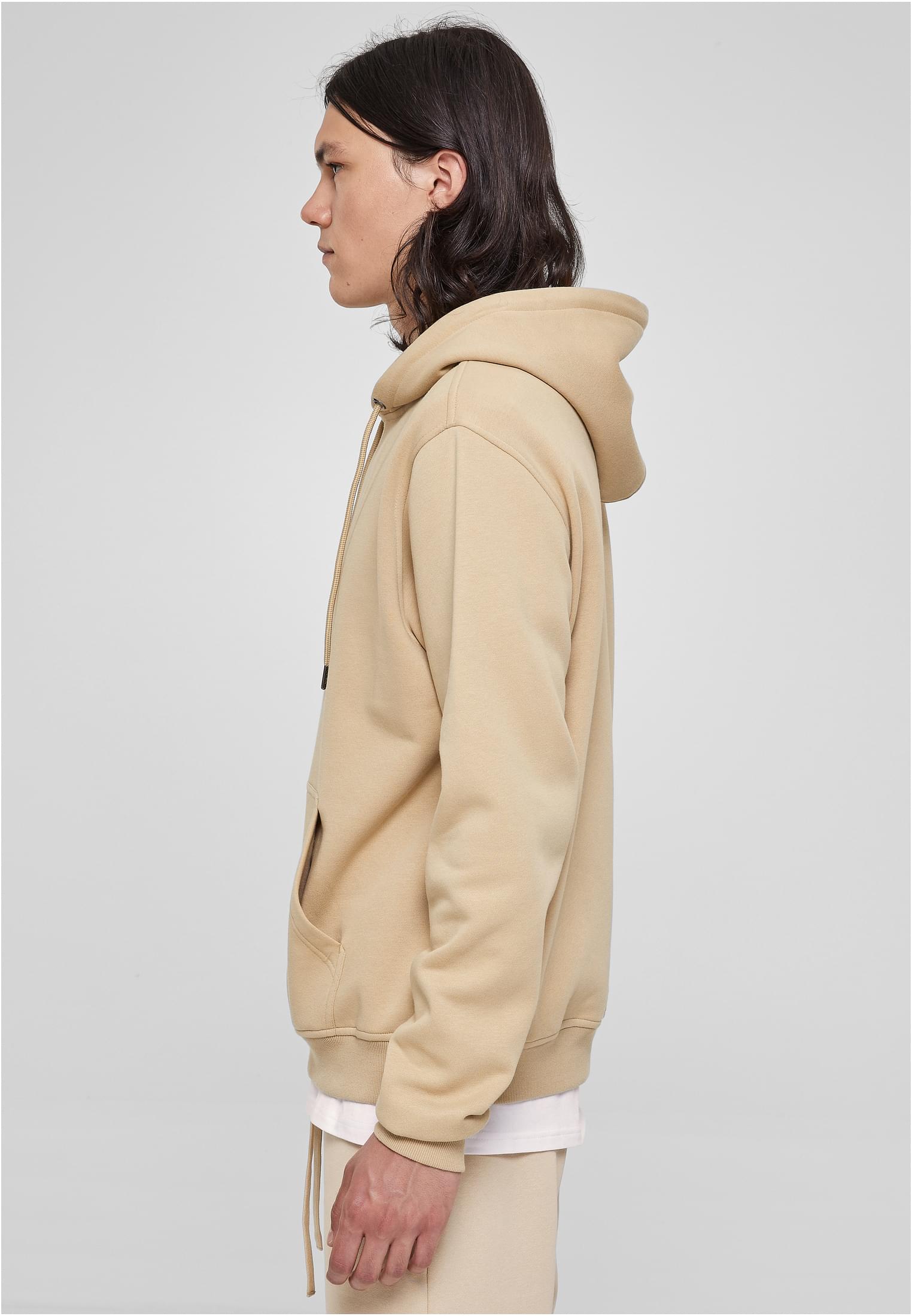 Basic Terry Hoodie in soft terry fabric, featuring a classic cut, ribbed cuffs, tonal strings, and a kangaroo pocket.