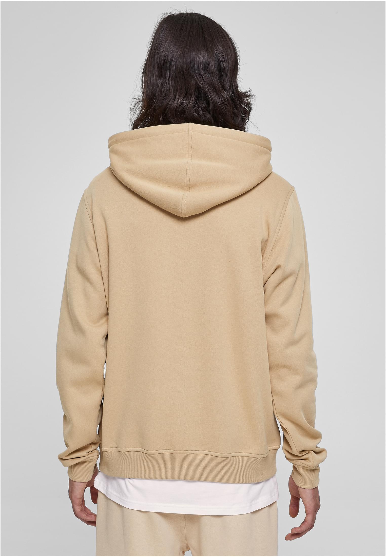 Basic Terry Hoodie in soft terry fabric, featuring a classic cut, ribbed cuffs, tonal strings, and a kangaroo pocket.