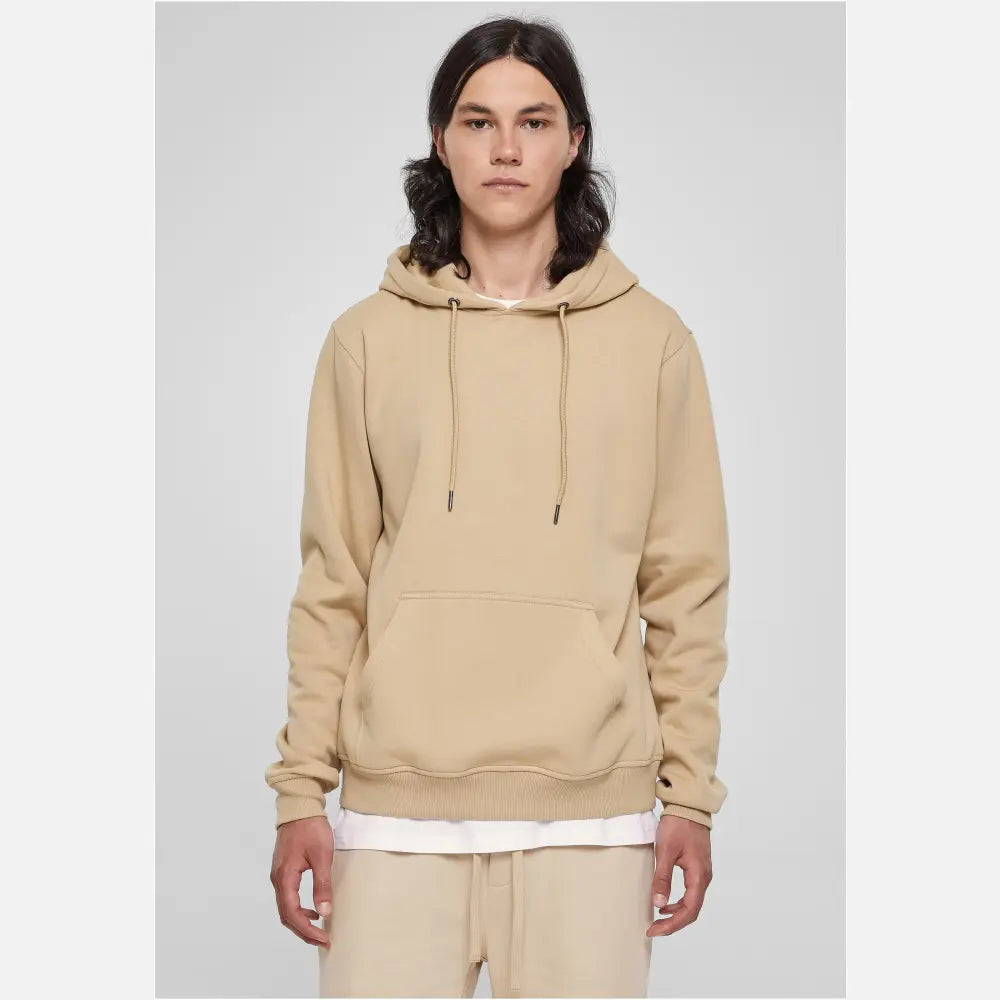 Basic Terry Hoodie in soft terry fabric, featuring a classic cut, ribbed cuffs, tonal strings, and a kangaroo pocket.