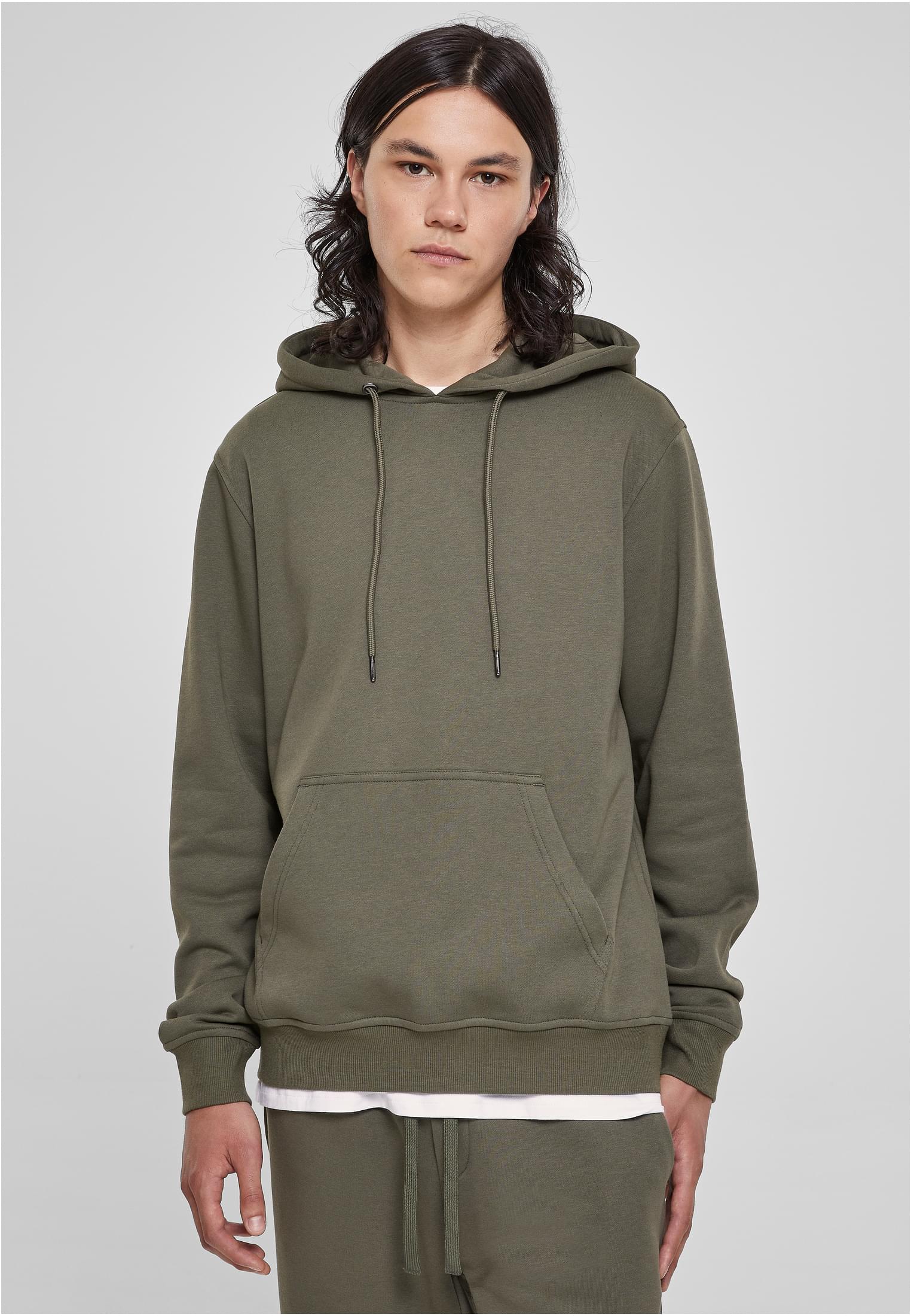 Basic Terry Hoodie in soft terry fabric, featuring a classic cut, ribbed cuffs, tonal strings, and a kangaroo pocket.