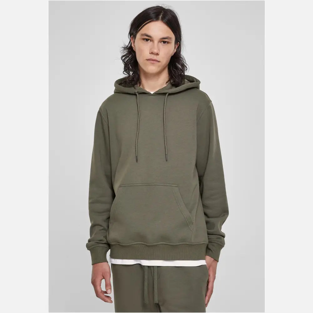 Basic Terry Hoodie in soft terry fabric, featuring a classic cut, ribbed cuffs, tonal strings, and a kangaroo pocket.