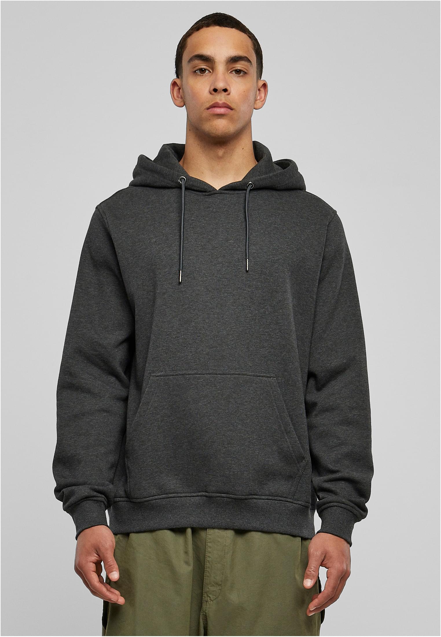 Basic Terry Hoodie in soft terry fabric, featuring a classic cut, ribbed cuffs, tonal strings, and a kangaroo pocket.