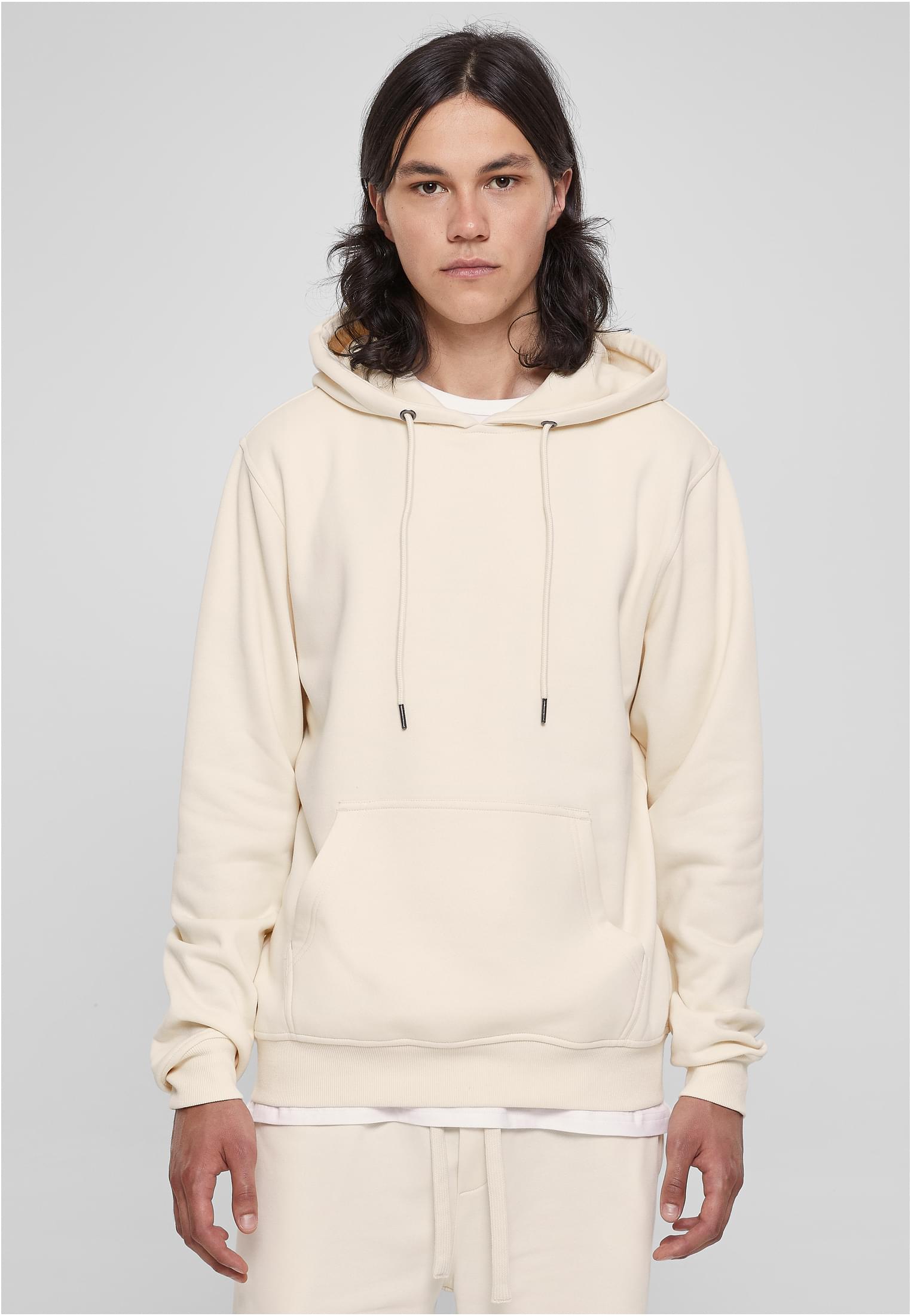 Basic Terry Hoodie in soft terry fabric, featuring a classic cut, ribbed cuffs, tonal strings, and a kangaroo pocket.