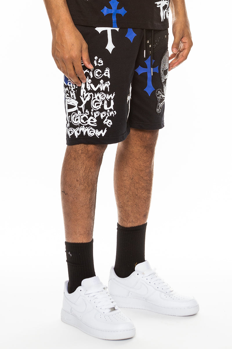 Bejewelled Chrome Skull Shorts featuring a unique skull design, elastic waist, and standard pockets, made from a cotton-polyester blend.