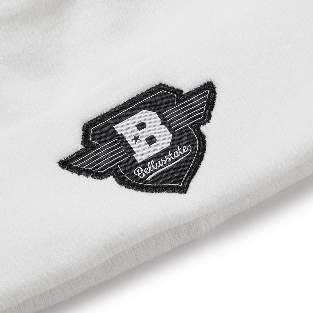 Bellusstate Crest Cuff Beanie in soft acrylic with a stylish crest design, perfect for unisex wear.