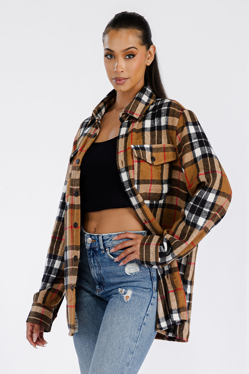 A stylish oversized flannel shacket for women, featuring button closure and chest pockets, made from soft brushed fabric.