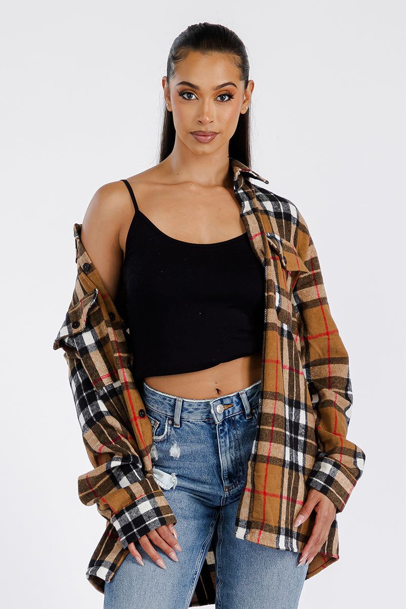 A stylish oversized flannel shacket for women, featuring button closure and chest pockets, made from soft brushed fabric.