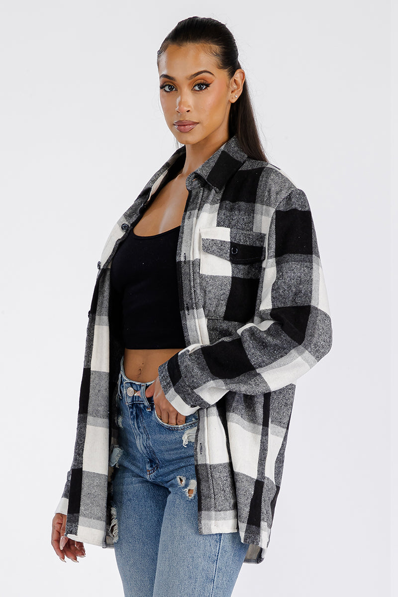 A stylish oversized soft flannel shacket for women, featuring button closure and chest pockets, perfect for layering.