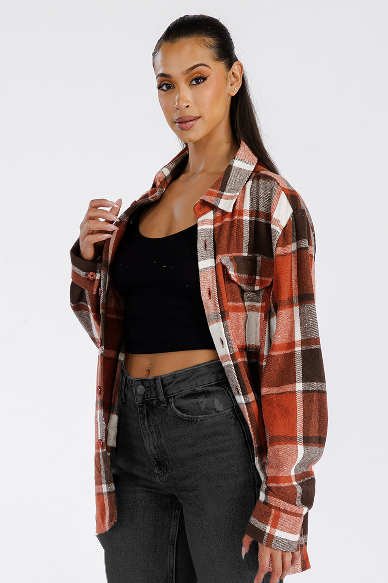 A stylish oversized flannel shacket for women, featuring button closure and chest pockets, made from soft brushed fabric.