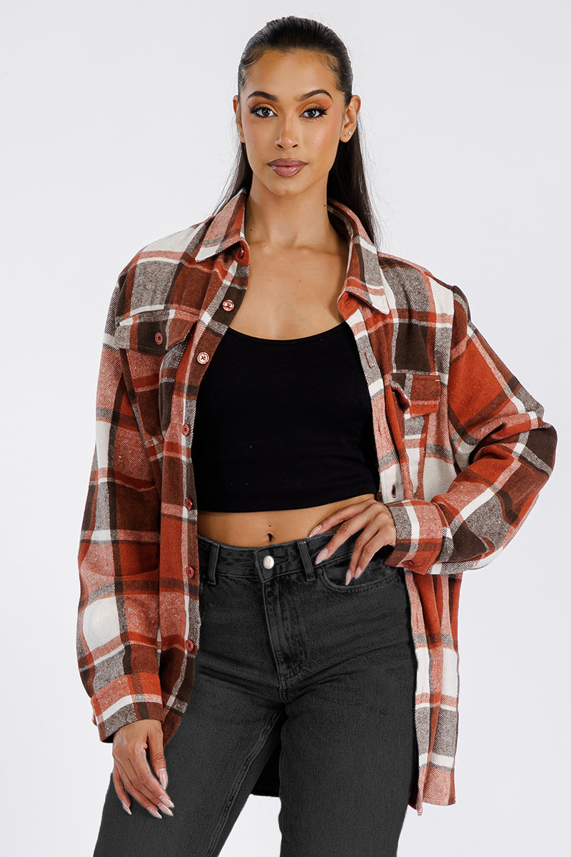 A stylish oversized flannel shacket for women, featuring button closure and chest pockets, made from soft brushed fabric.