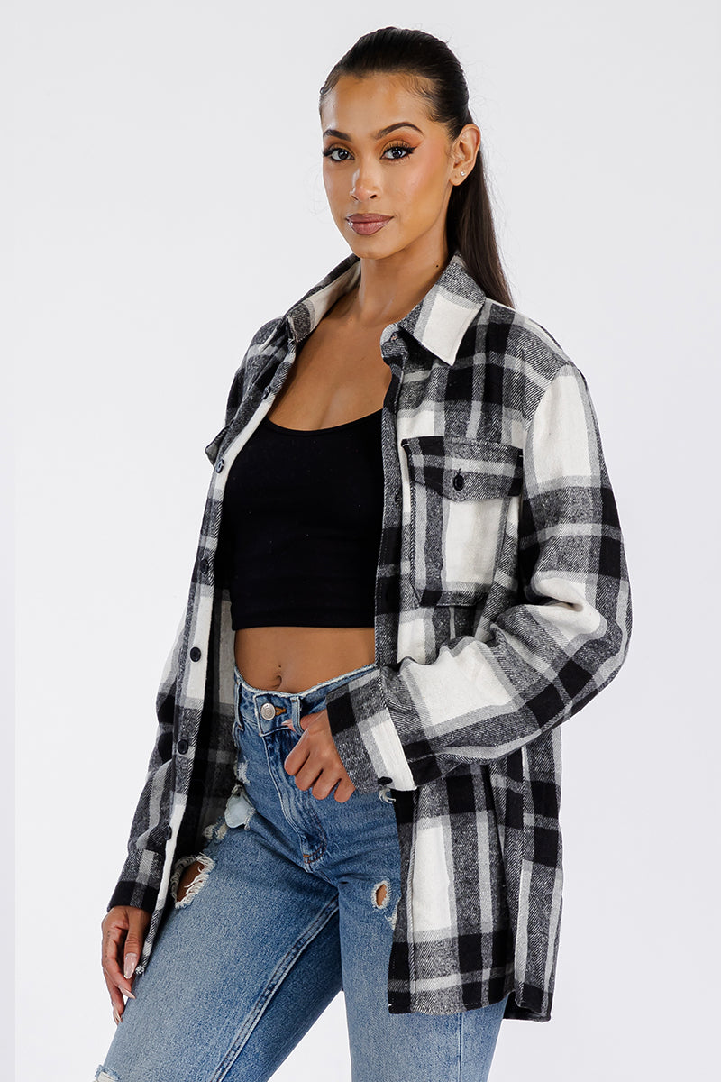 A stylish oversized flannel shacket for women, featuring button closure and chest pockets, made from soft brushed fabric.