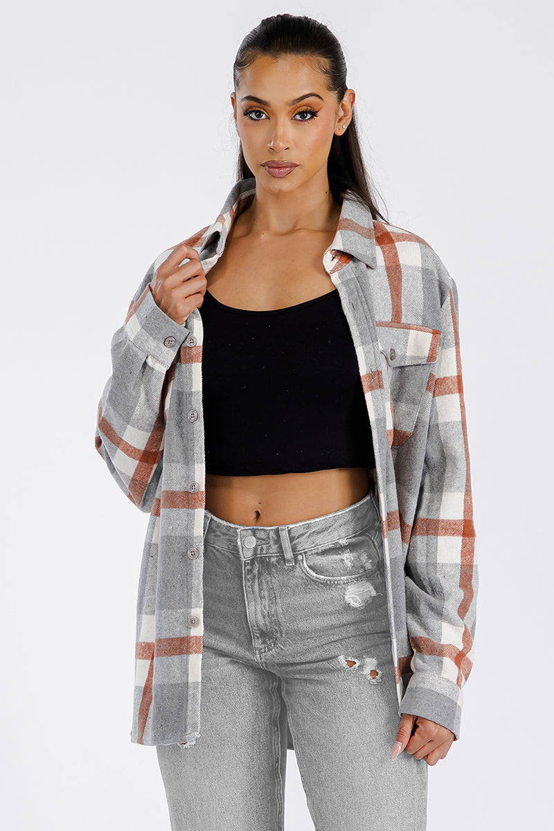 A stylish oversized flannel shacket in soft brushed fabric, featuring button closure and chest pockets, perfect for casual wear.