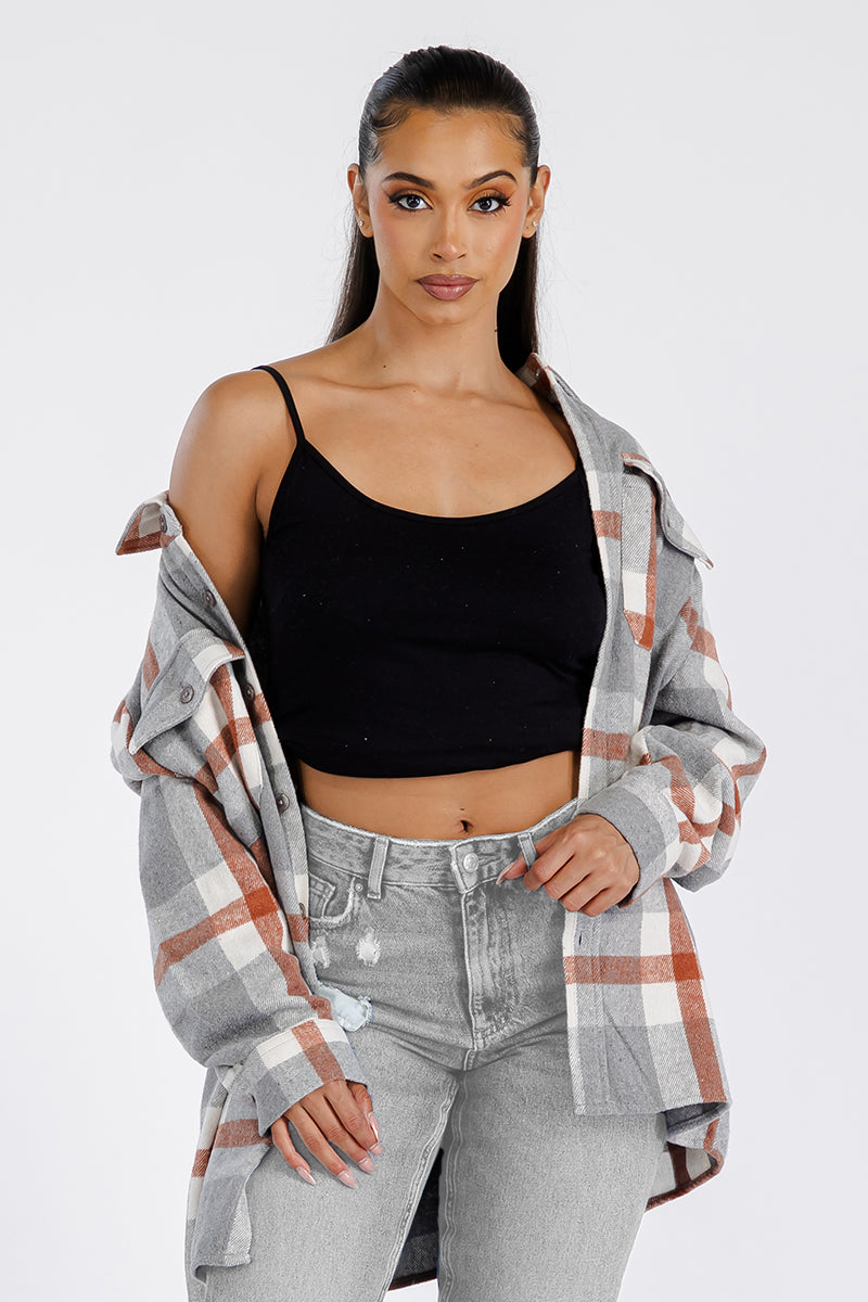 A stylish oversized flannel shacket in soft brushed fabric, featuring button closure and chest pockets, perfect for casual wear.