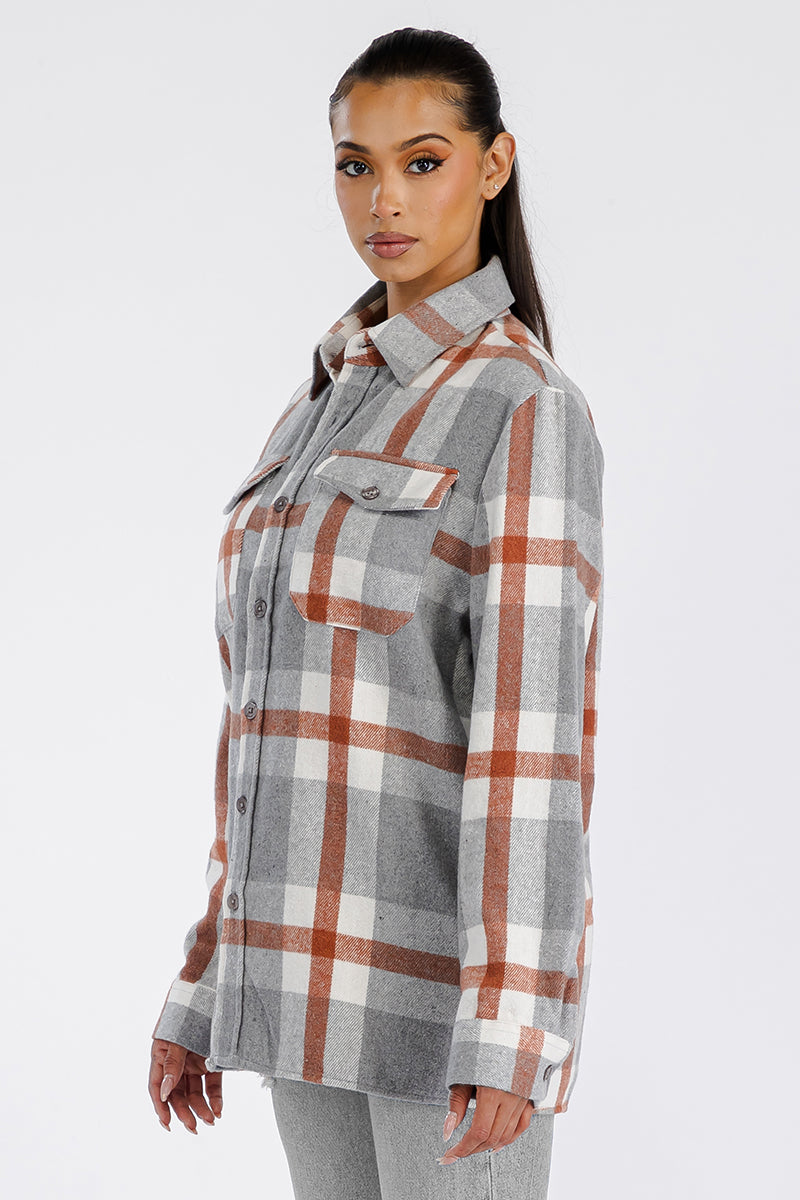 A stylish oversized flannel shacket in soft brushed fabric, featuring button closure and chest pockets, perfect for casual wear.