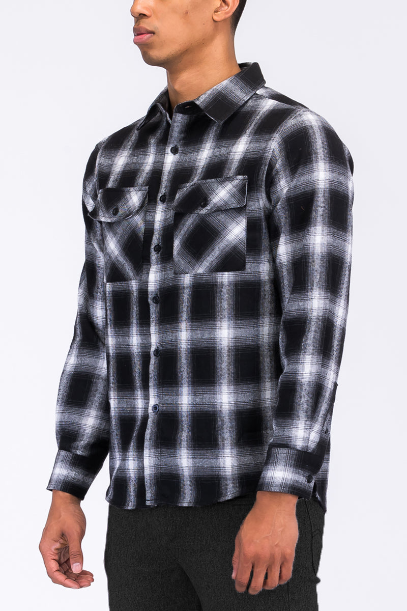 A cozy brushed flannel shirt in a stylish design, featuring chest pockets and button closure, perfect for casual wear.