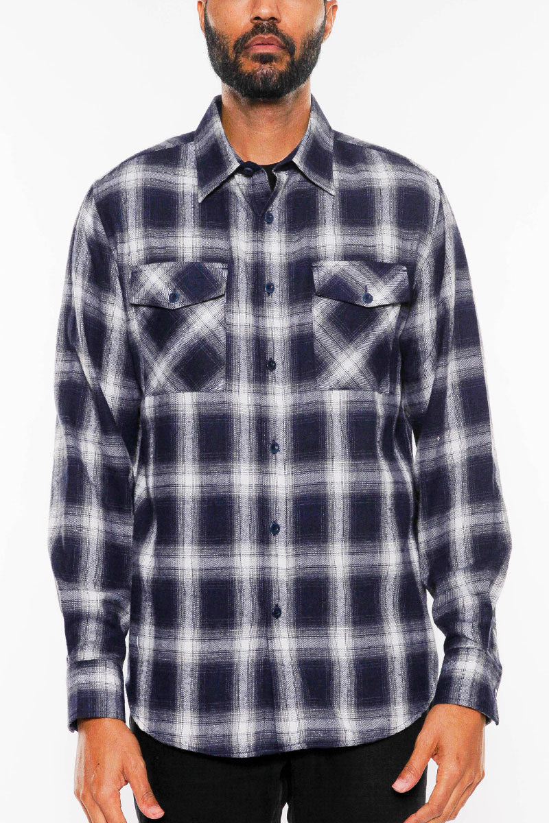 A cozy brushed flannel shirt in a stylish design, featuring chest pockets and button closure, perfect for casual wear.