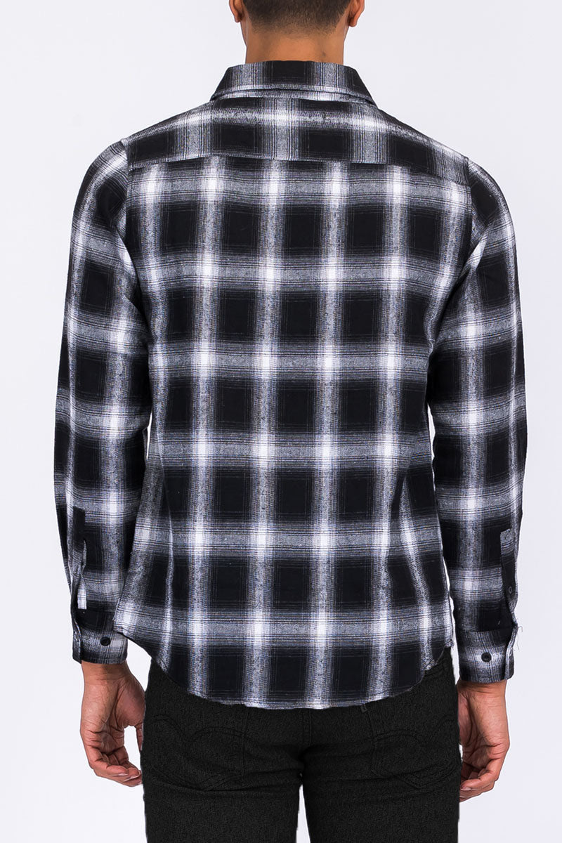 A cozy brushed flannel shirt in a stylish design, featuring chest pockets and button closure, perfect for casual wear.