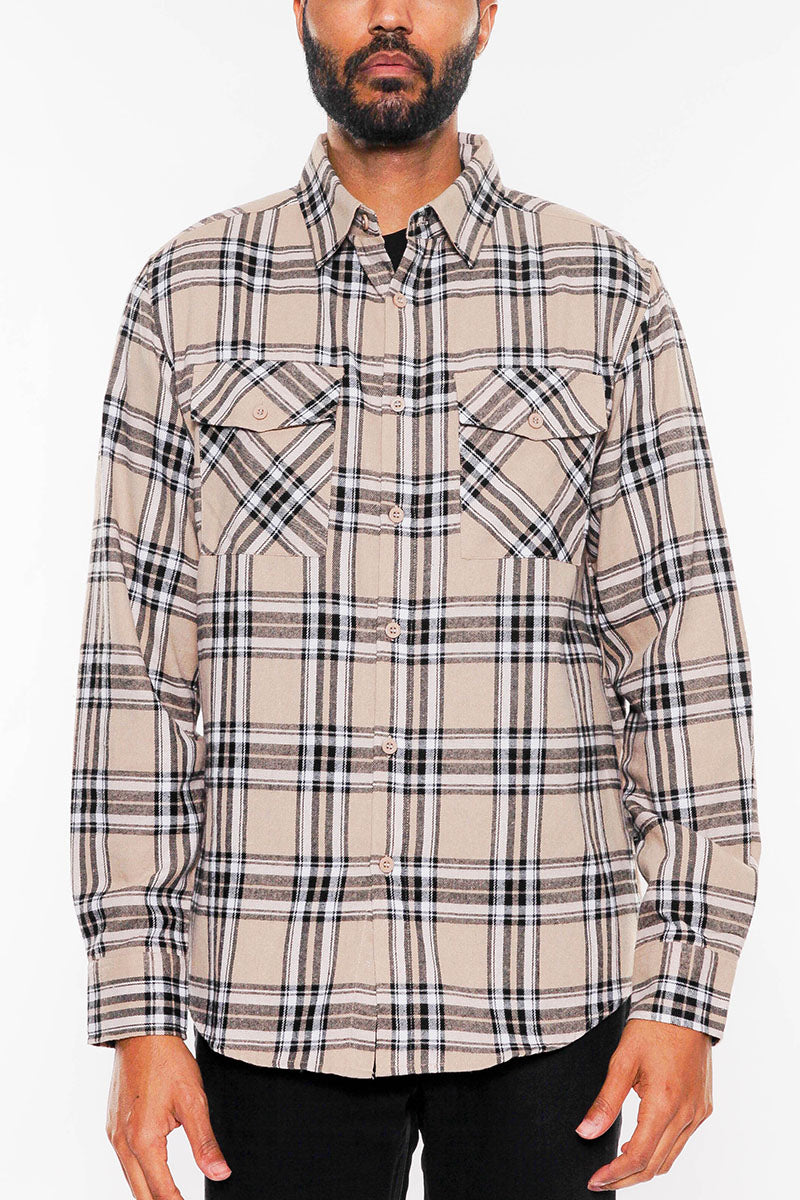 A stylish brushed flannel shirt featuring chest pockets and button closure, perfect for casual wear.