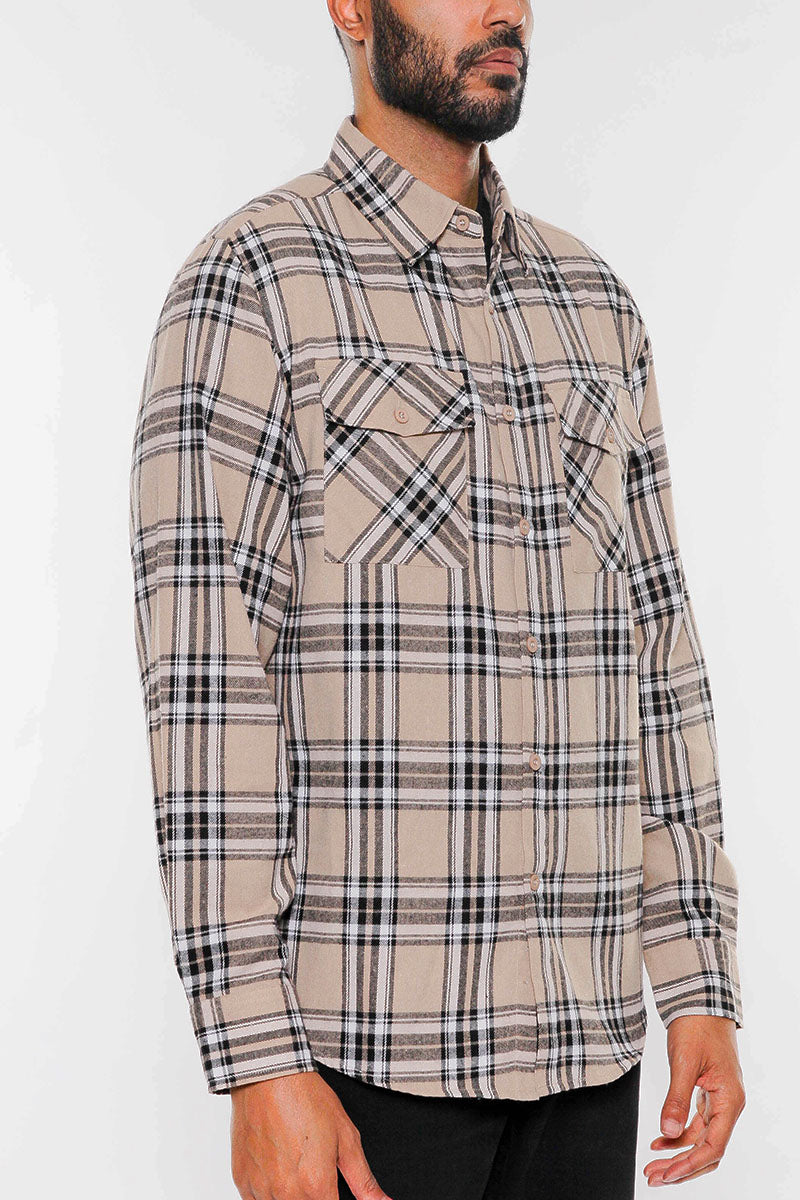 A stylish brushed flannel shirt featuring chest pockets and button closure, perfect for casual wear.