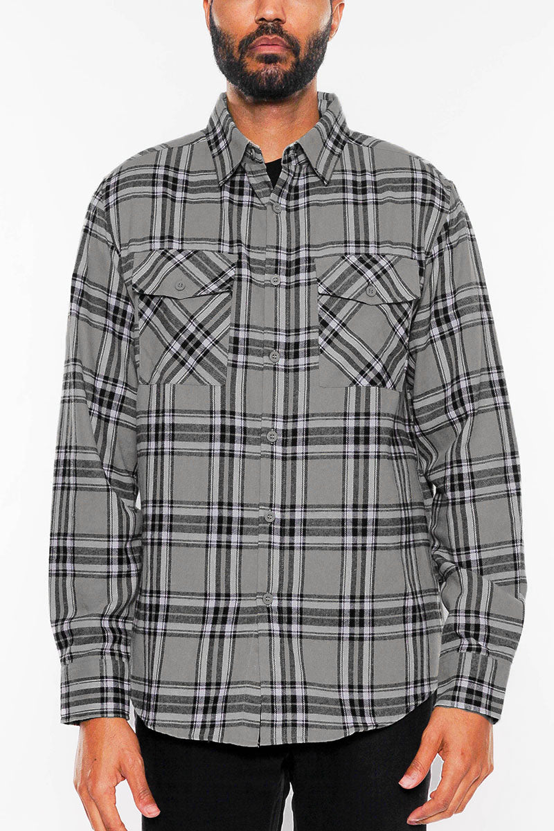 A stylish brushed flannel shirt featuring chest pockets and button closure, perfect for casual wear.