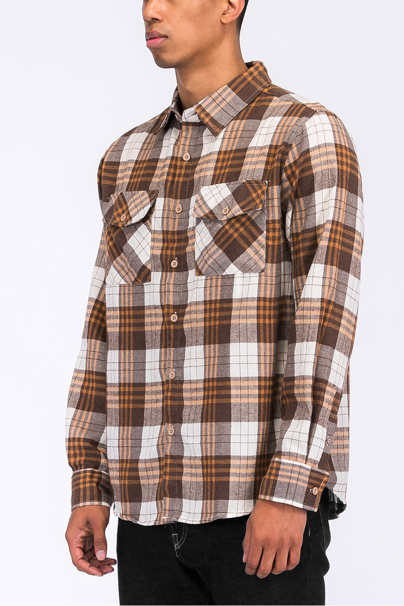 A stylish brushed flannel shirt featuring chest pockets and button closure, perfect for casual wear.