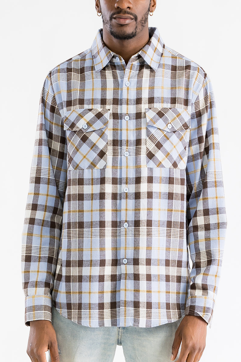 A stylish brushed flannel shirt featuring chest pockets and button closure, perfect for casual wear.