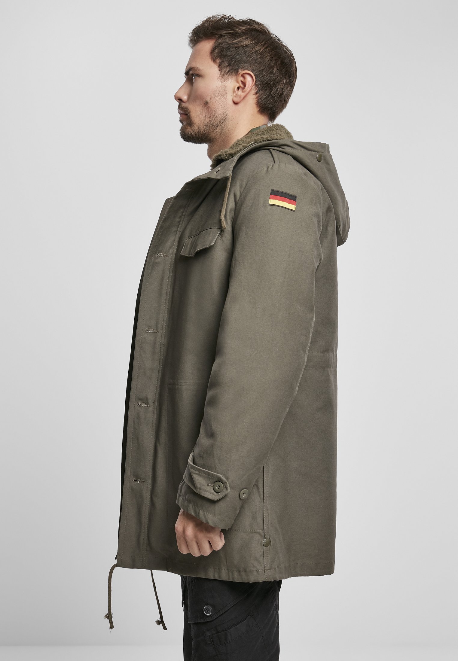 BW Parka featuring a large hood, adjustable waist, and military insignia, perfect for winter wear.