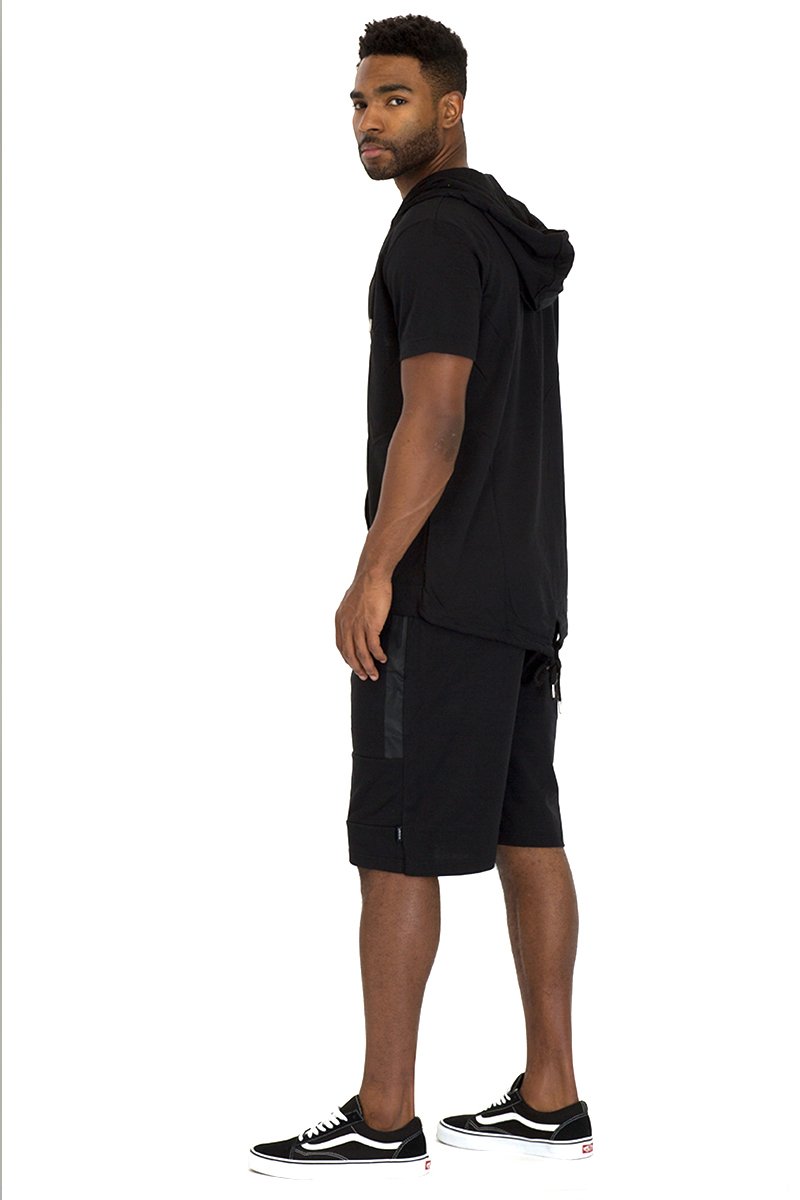 CAGE SHORT ATHLETIC SET in black featuring a full zip hoodie and matching shorts, showcasing lightweight fabric and stylish design.