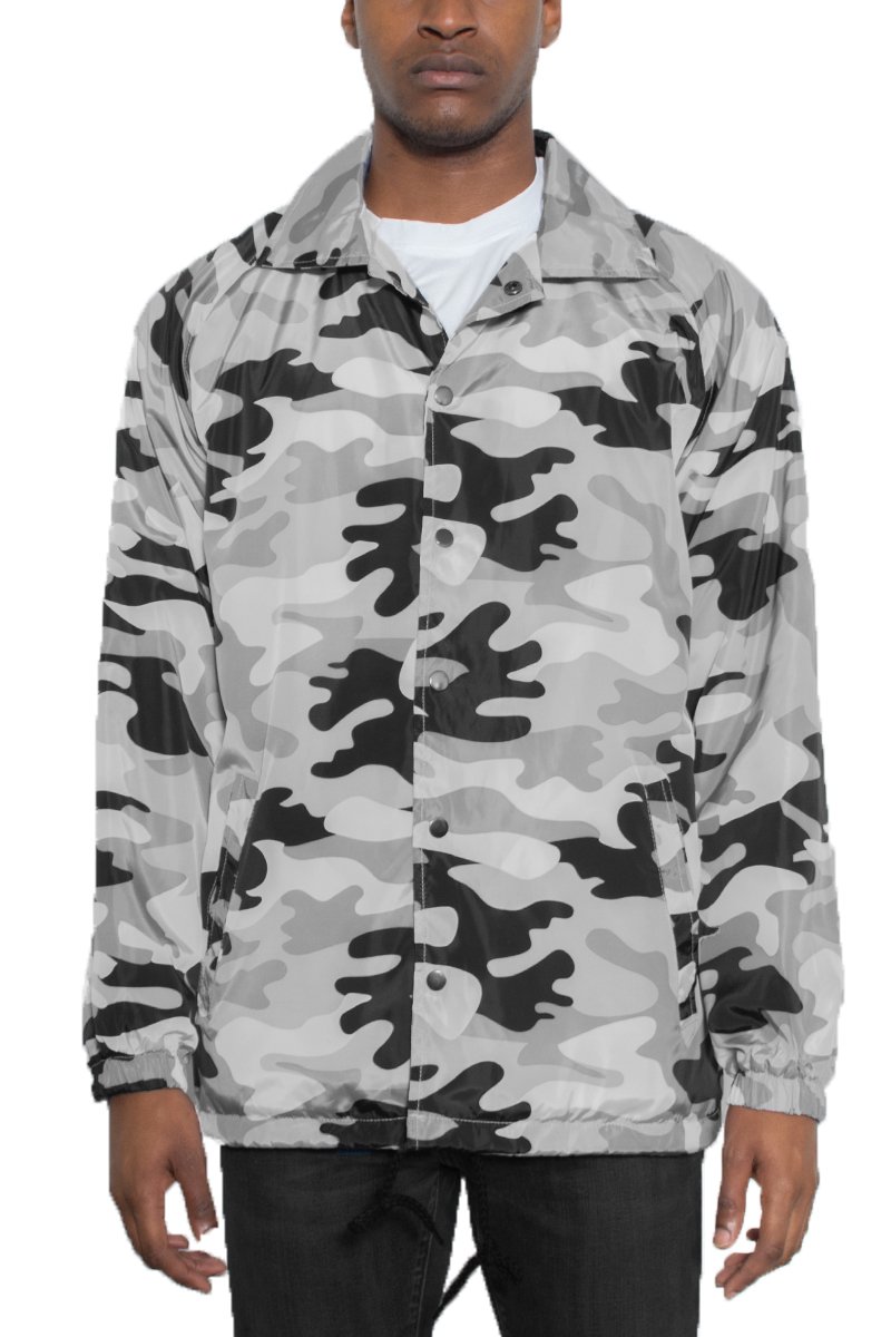 CAMO COACHS JACKET featuring a camouflage design, snap button closure, and multiple pockets, perfect for outdoor activities.