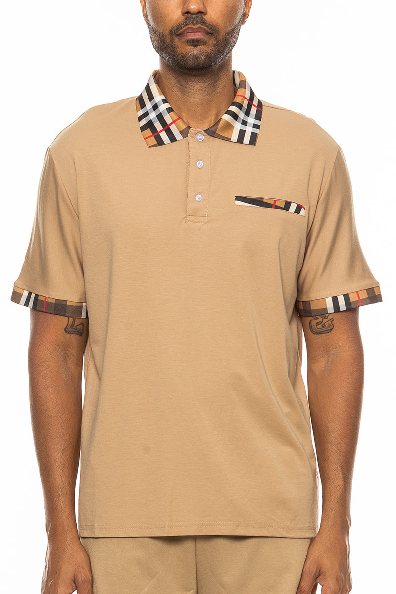 Checkered Detail Polo featuring plaid collar, sleeve hem, and chest pocket in a solid body design.