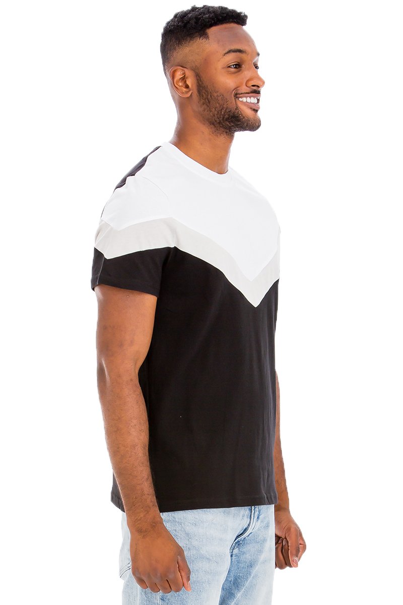 Chevron Colorblock T-shirt featuring a three-color block design, made from 100% cotton, displayed on a model.