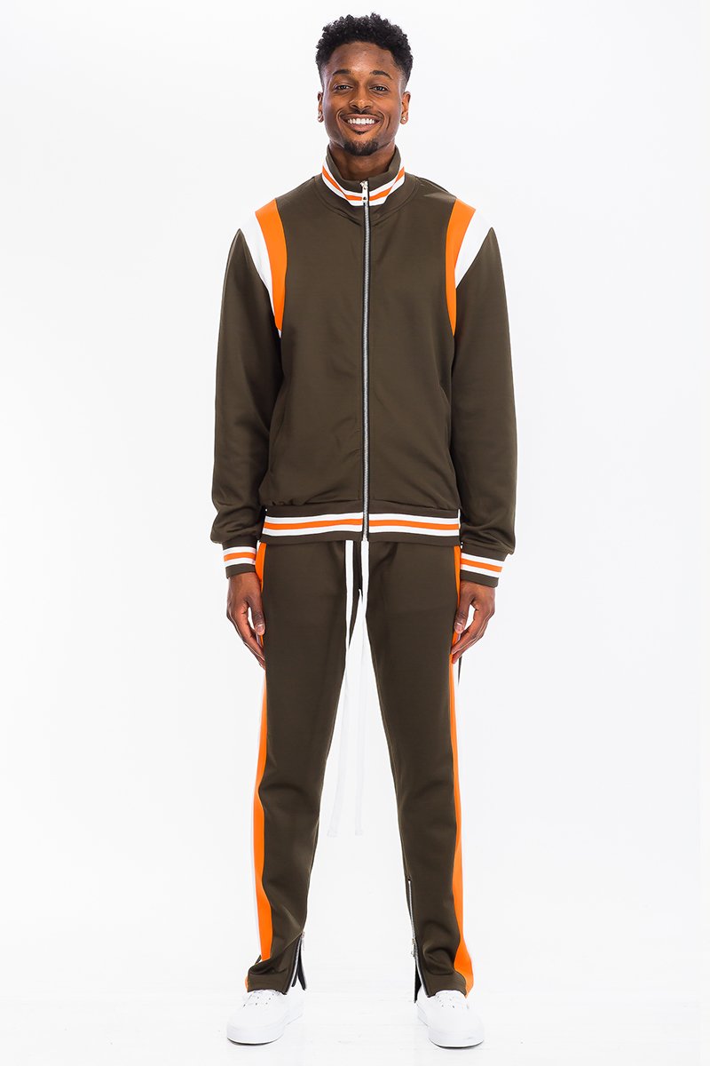 CHEVY TRACK SET featuring a full zip jacket and drawstring pants with dual chevron stripes, designed for comfort and style.