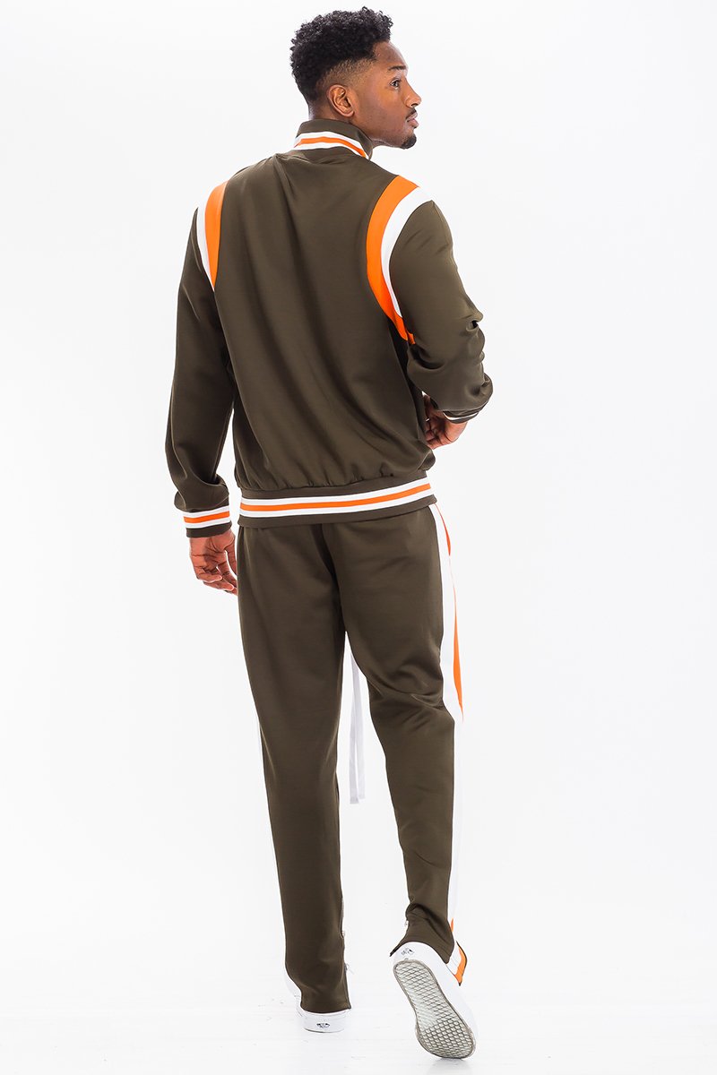 CHEVY TRACK SET featuring a full zip jacket and drawstring pants with dual chevron stripes, designed for comfort and style.