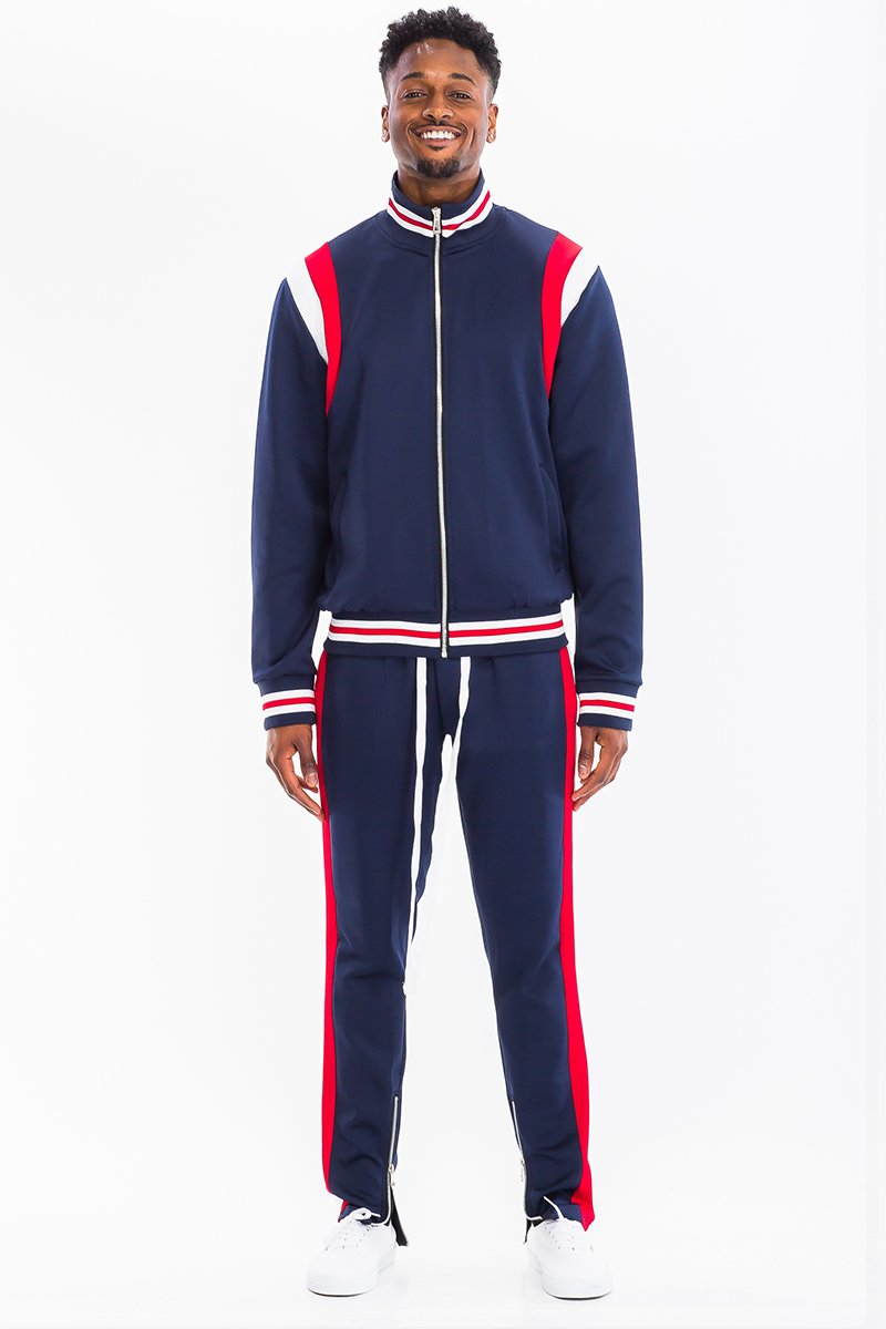 CHEVY TRACK SET featuring a full zip jacket and drawstring pants with dual chevron stripes, perfect for athletic wear.