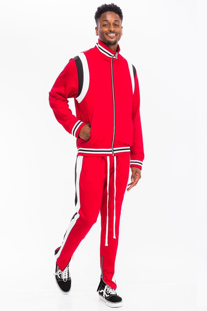 CHEVY TRACK SET featuring a full zip jacket and drawstring pants with dual chevron stripes, perfect for athletic wear.