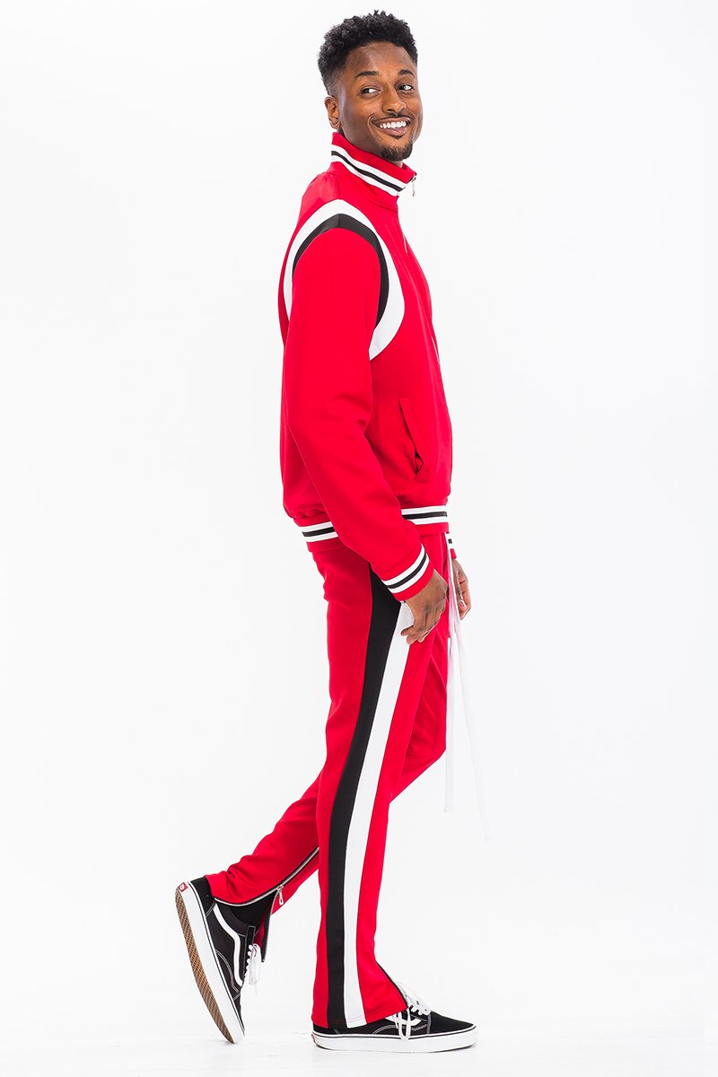 CHEVY TRACK SET featuring a full zip jacket and drawstring pants with dual chevron stripes, perfect for athletic wear.