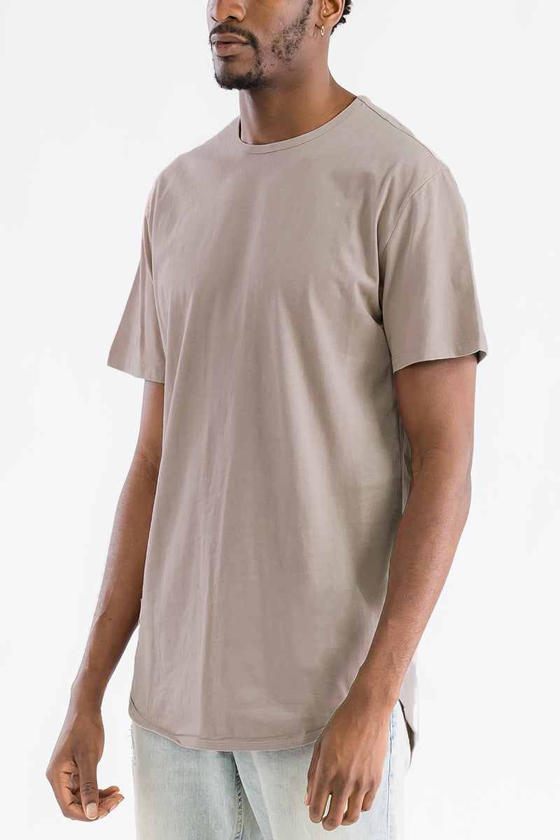 A stylish Classic Scallop Tee featuring a scallop extended rounded edge design, made from 100% cotton, displayed on a mannequin.