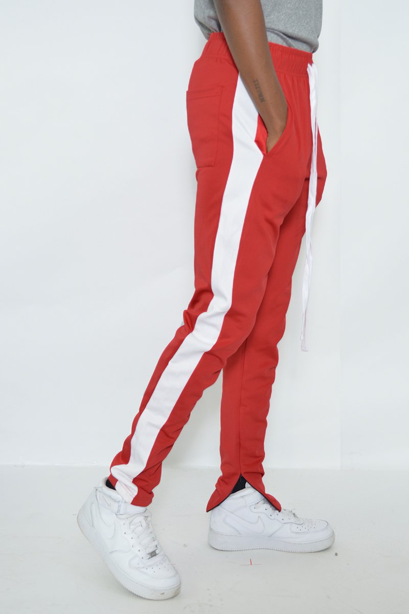 Classic slim fit track pants with single stripe detail and hidden ankle zipper, perfect for workouts and casual wear.