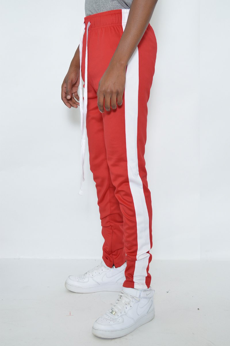 Classic slim fit track pants with single stripe detail and hidden ankle zipper, perfect for workouts and casual wear.