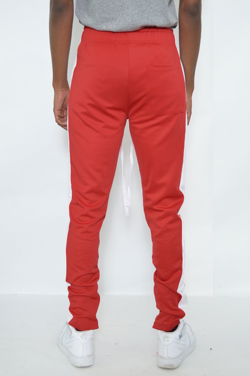 Classic slim fit track pants with single stripe detail and hidden ankle zipper, perfect for workouts and casual wear.