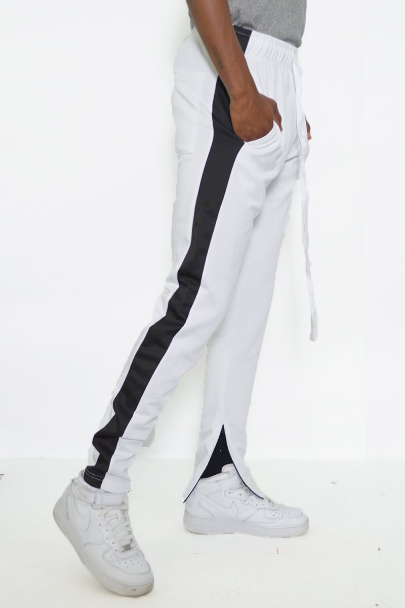 Classic Slim Fit Track Pants featuring a sleek design with a single stripe detail and hidden ankle zippers.